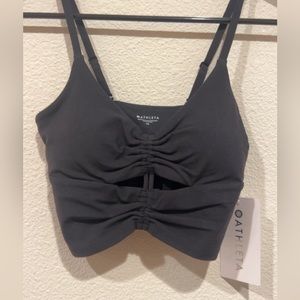 ATHLETA cinch slit crop tank.